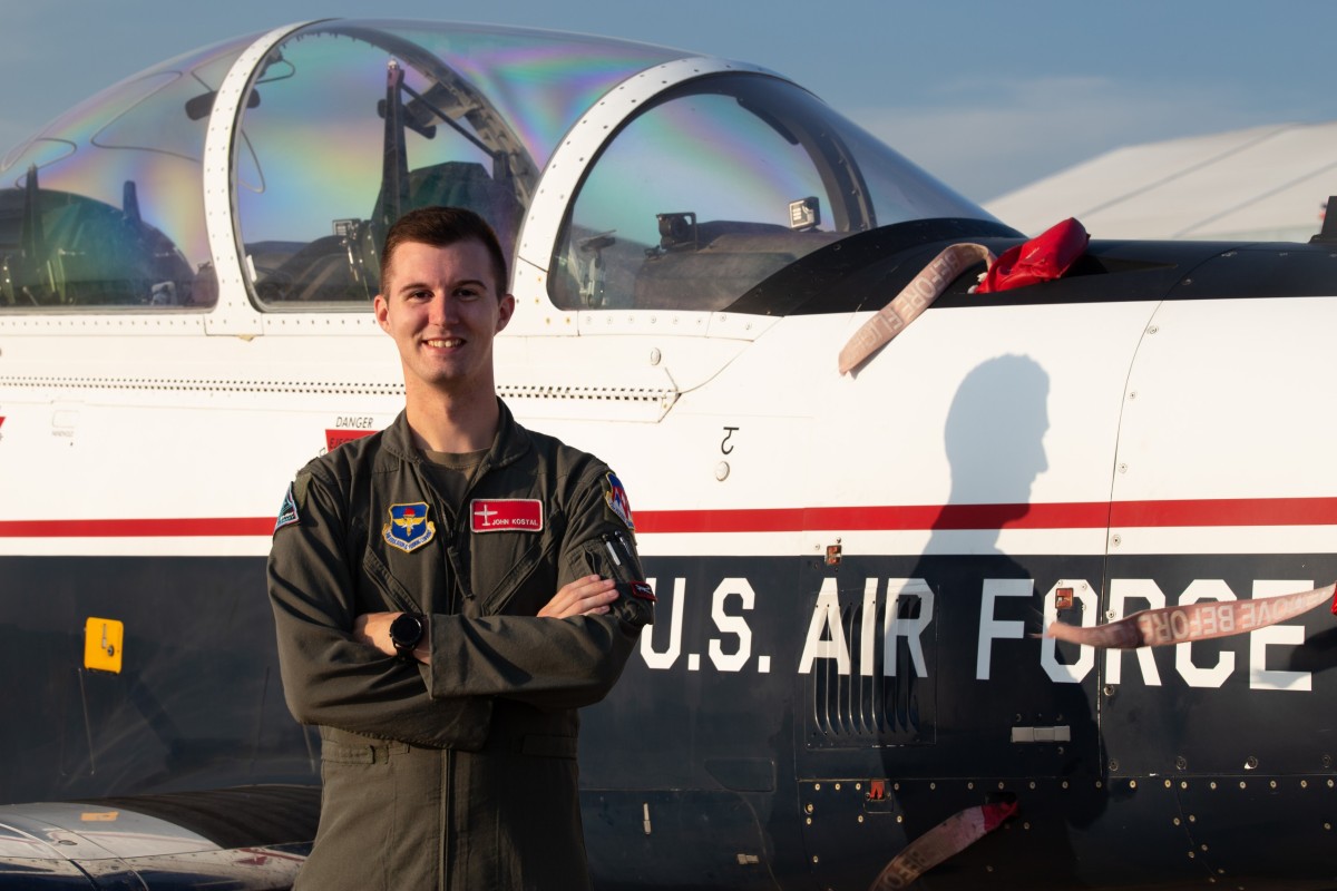 First Lieutenant John Kostal stands (and flies!) proud as a United States Air Force officer.