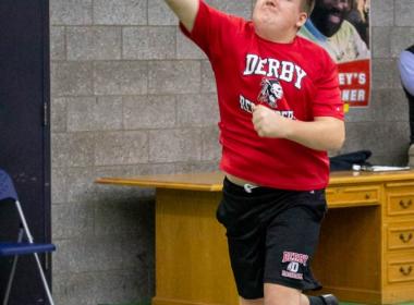 Michael throwing a shotput