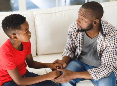 Father and son talking