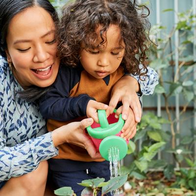 Mother and her child gardening