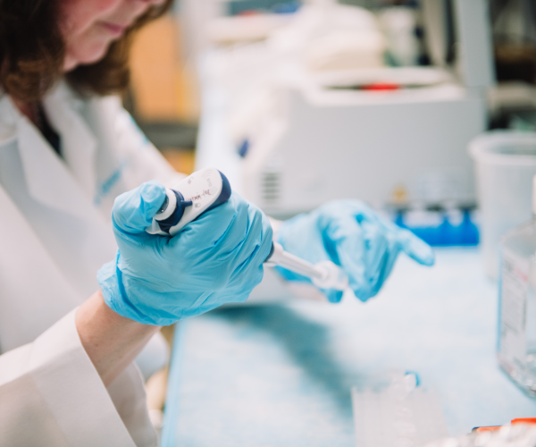 Dr. Germain-lee conducting research at a lab.